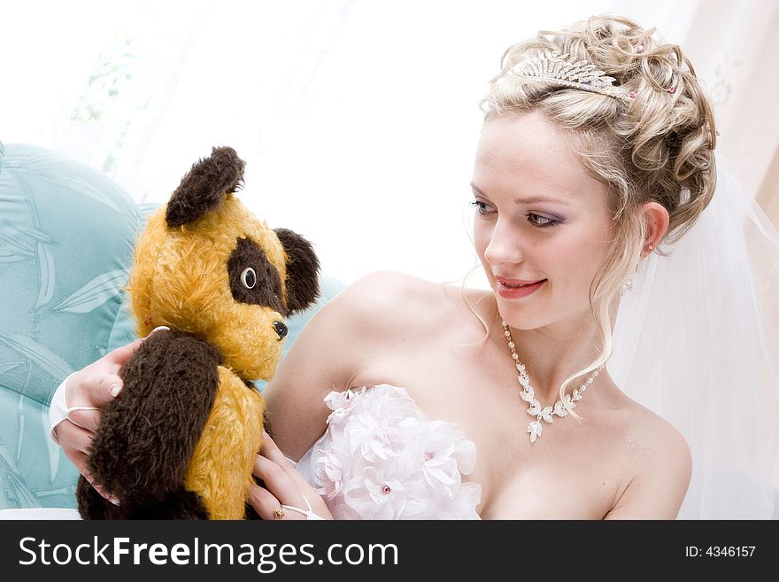 Bride with a toy from her childhood