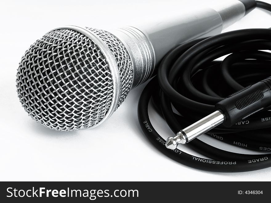 Microphone And Cable On On A White Background