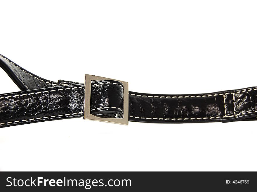 Buckle of a black leather bag isolated on white. Buckle of a black leather bag isolated on white