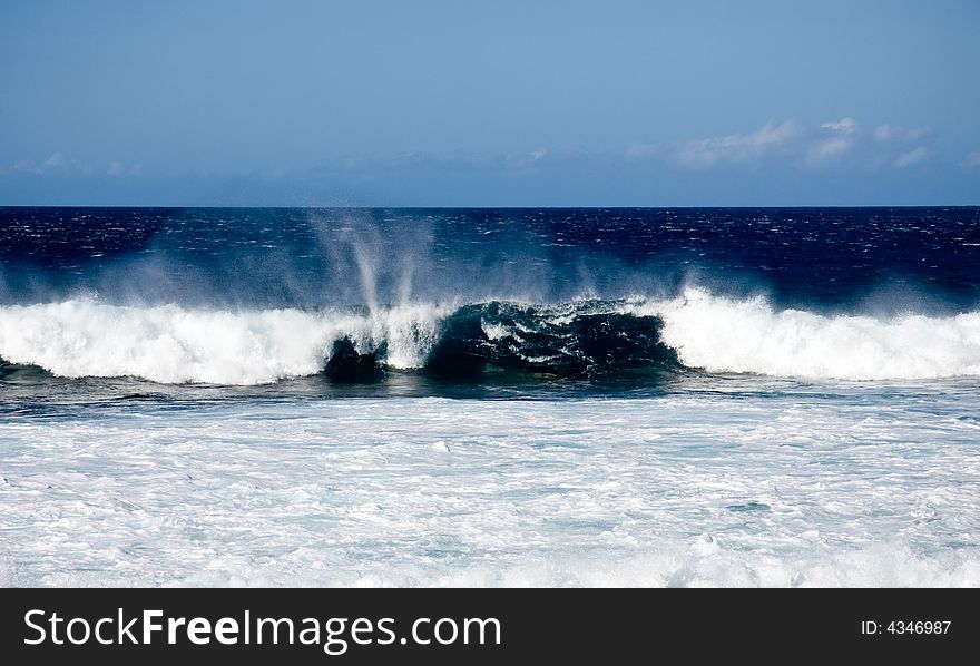 Rolling surf on windy day off coast of Hawaii. Rolling surf on windy day off coast of Hawaii