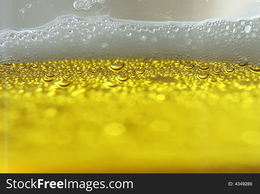 Close up of the bubbles in a glass of beer. Close up of the bubbles in a glass of beer