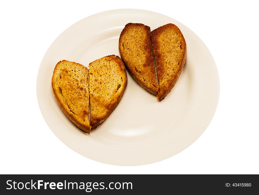 White plate with two heart-shaped toast