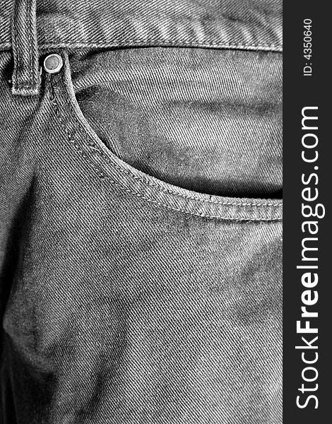 A grey color pocket jeans. A grey color pocket jeans