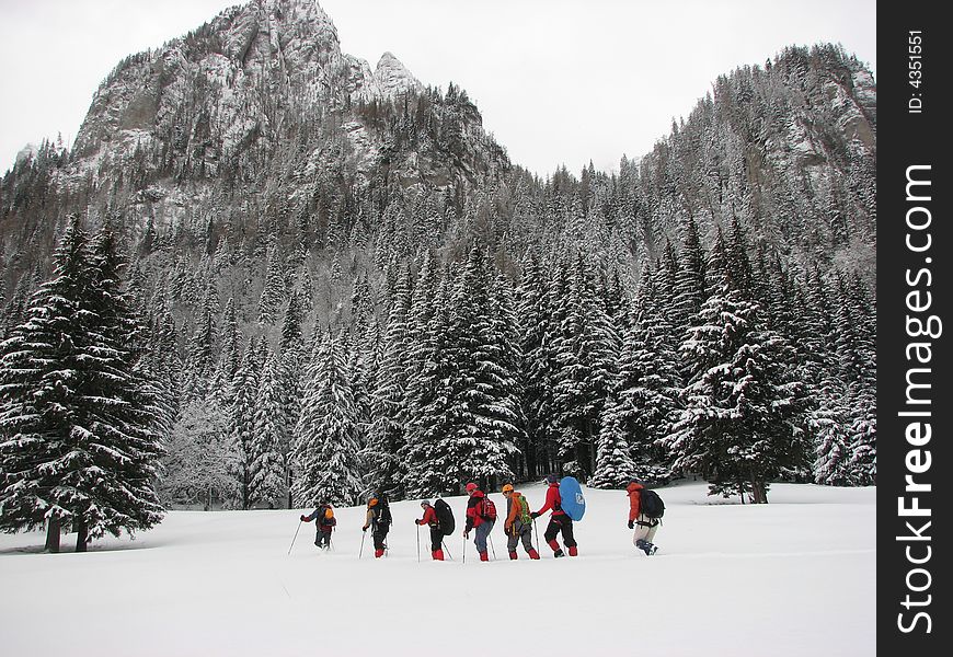 A group of people having a trip in the mountains. A group of people having a trip in the mountains