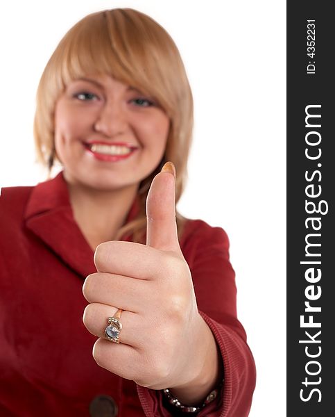 An image of girl in red suit. Showing his thumb. An image of girl in red suit. Showing his thumb.