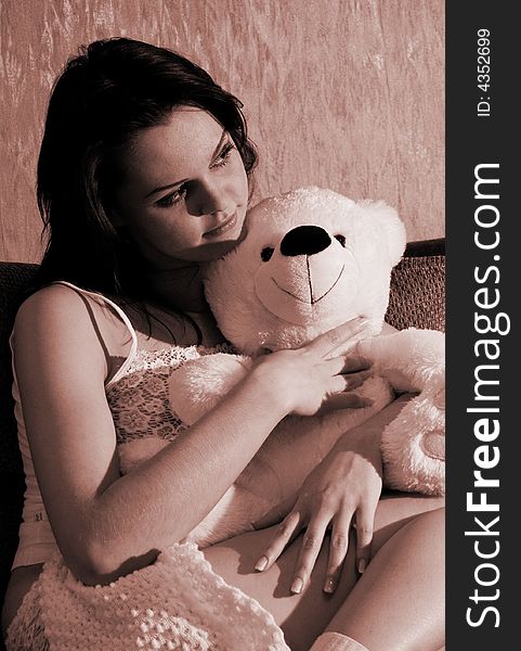 Girl with a toy bear