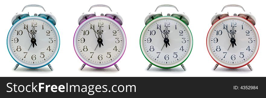 Old alarm clock on a white background