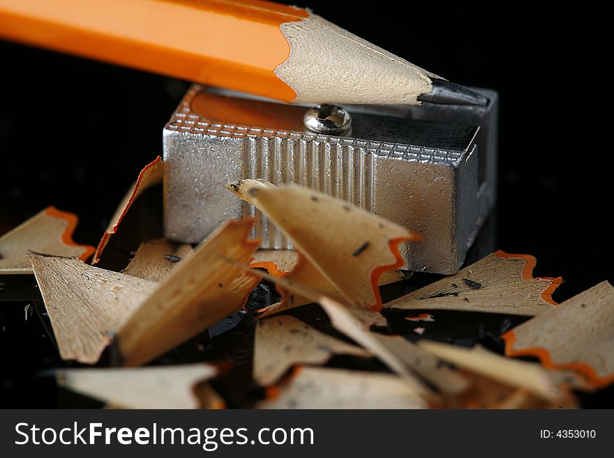 Close up of sharpener and pencil