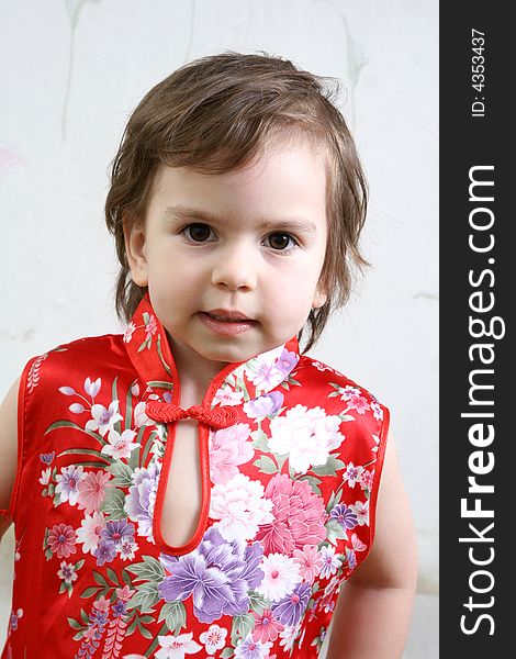 Little girl in red Chinese dress. Little girl in red Chinese dress