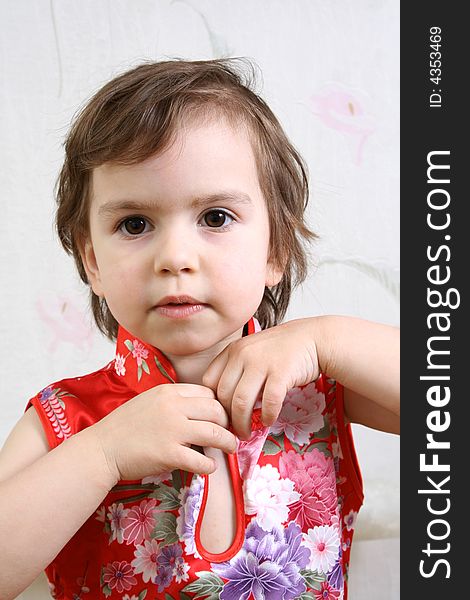 Little girl in red Chinese dress. Little girl in red Chinese dress