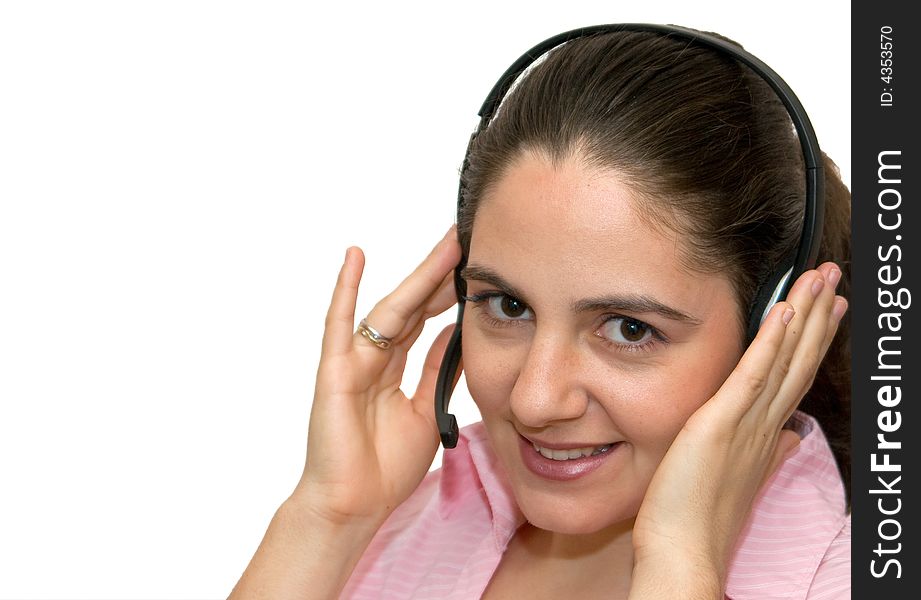 A girl, wearing headphones and microphone, smiling, looking very satisfied. A girl, wearing headphones and microphone, smiling, looking very satisfied