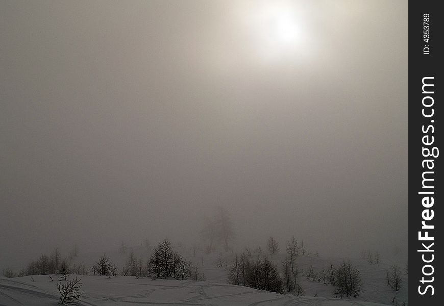 Fog and snow in the high mountains