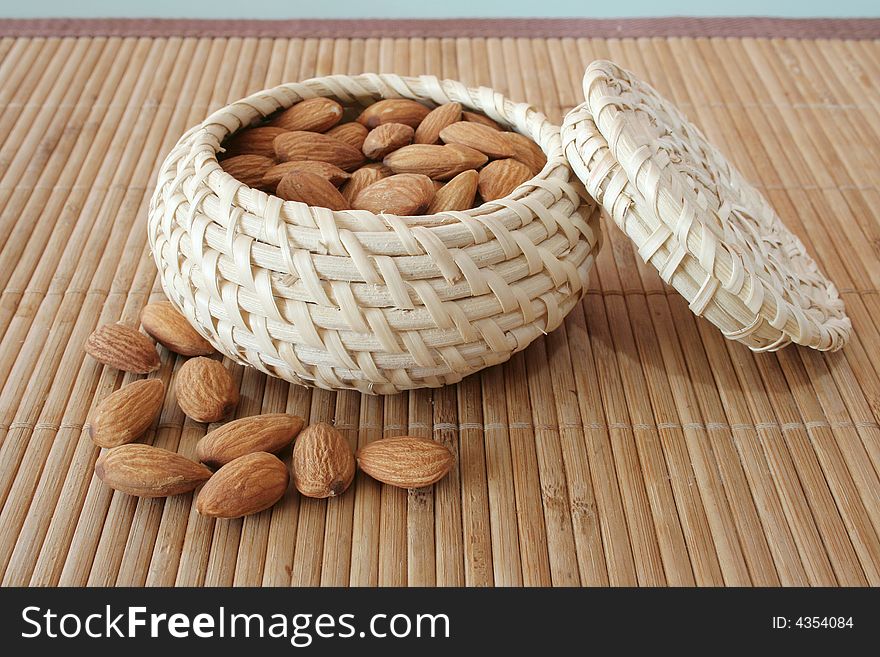 Almonds in the basket on the table