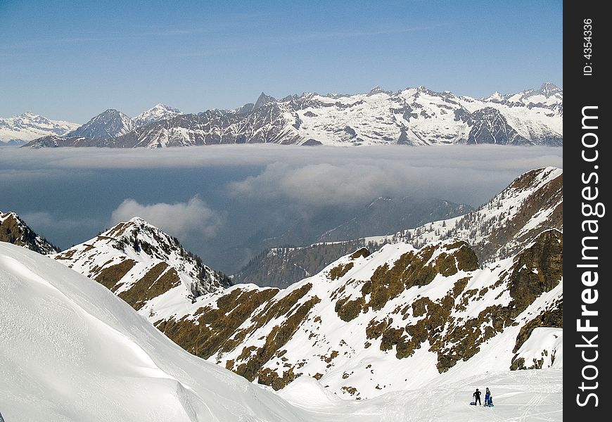 On the top of a mountain above the clouds