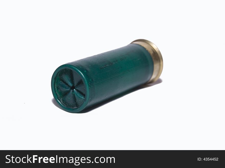 Single shotgun cartridge lying down viewed from the front