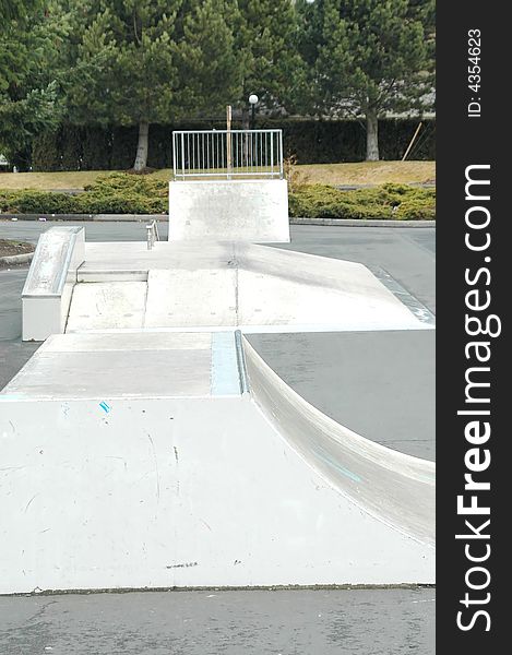 Skateboarding ramp in a park outdoors. Skateboarding ramp in a park outdoors.