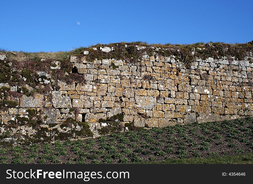 Medieval stone wall part of the Fortress in Besancon. Medieval stone wall part of the Fortress in Besancon.