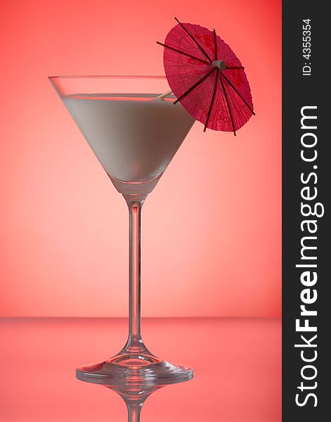 Milky cocktail with umbrella