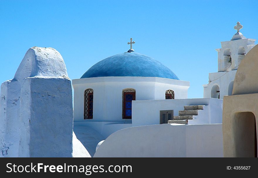 Whitewashed church in hot and sunny Santorini. Whitewashed church in hot and sunny Santorini