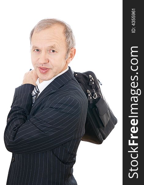 The adult businessman with a bag isolated on a white background. The adult businessman with a bag isolated on a white background