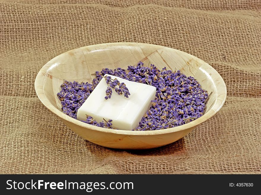 Perfume of lavender and soap on brown Background. Perfume of lavender and soap on brown Background