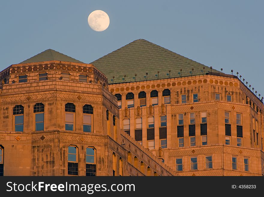 Moon over Merchandise Mart in Chicago