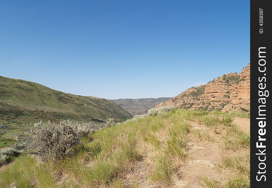 Looking over the cliffs into the distance or future