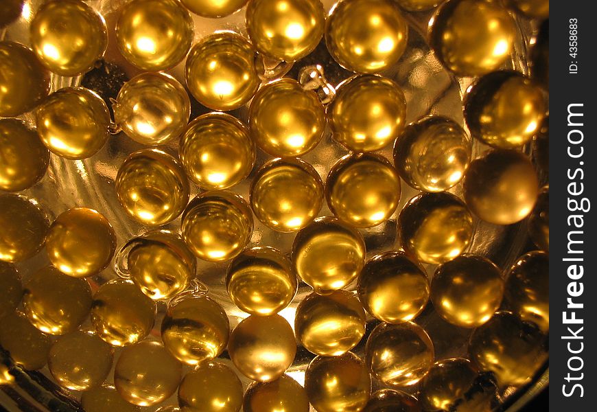 Close-up of gel gold capsules containing oil