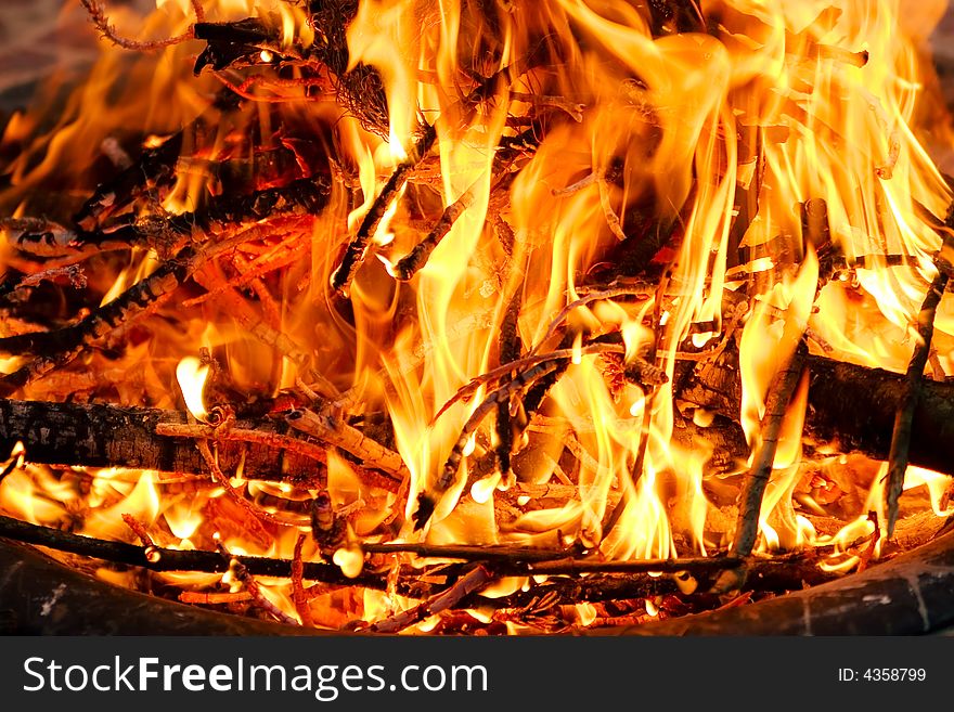 Close up of a campfire in the evening