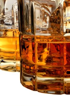 Glasses Of Whiskey And Ice Isolated Stock Photography