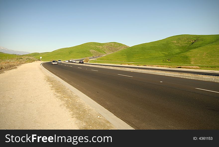 Two lane highway in the midst of country farmland. Two lane highway in the midst of country farmland