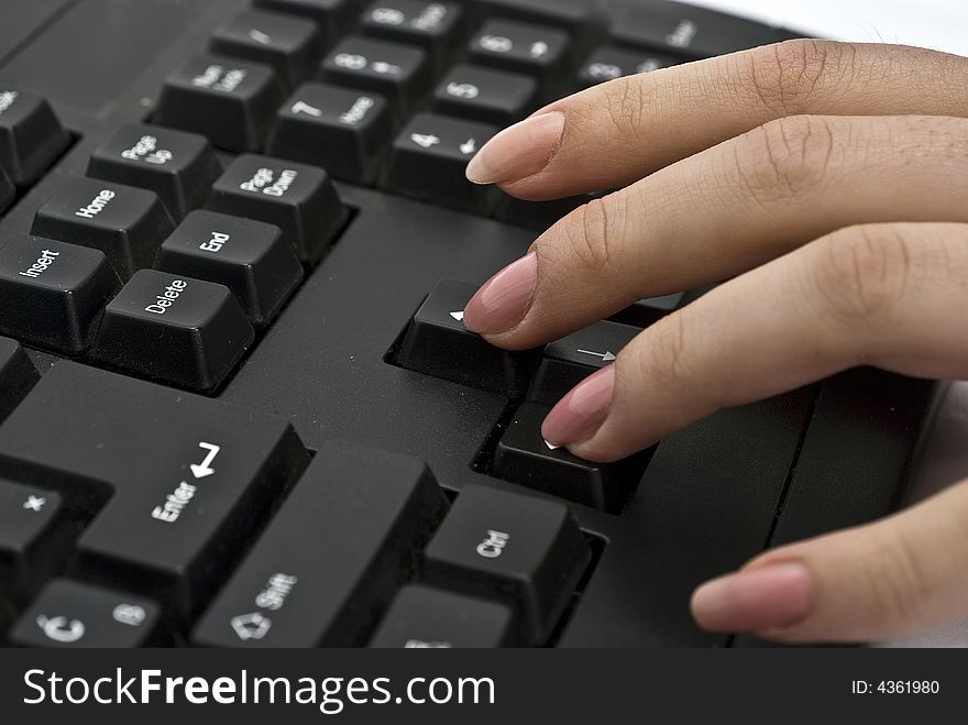 Woman typing on her keyboard. Woman typing on her keyboard