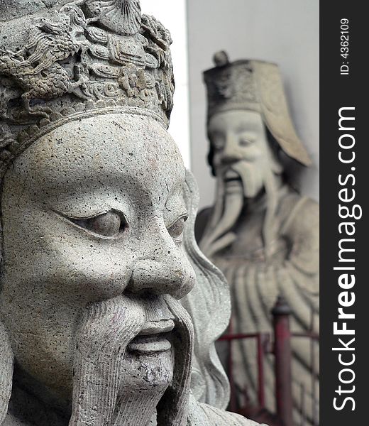 Asian Face Statue