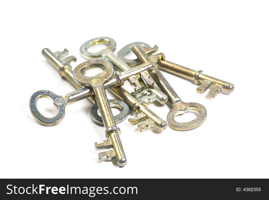 A pile of old vintage keys