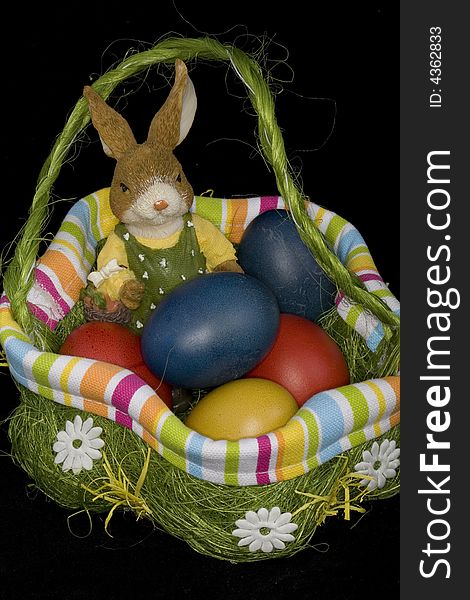 To Easter it is a custom to hide coloured Easter eggs and to give. Easter hare and Easter eggs as a symbol.