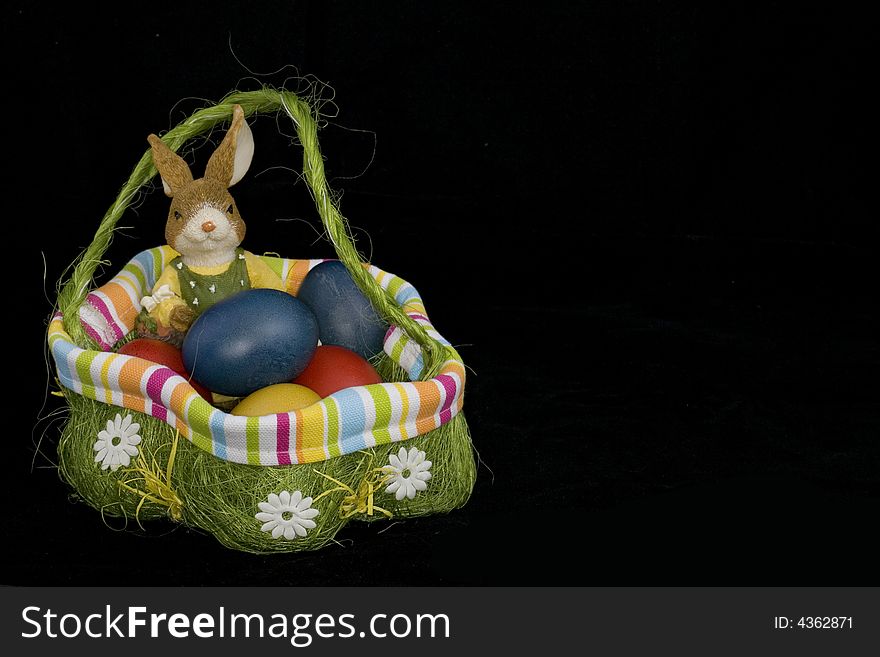 To Easter it is a custom to hide coloured Easter eggs and to give. Easter hare and Easter eggs as a symbol.