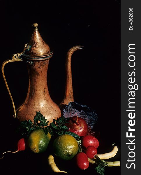 A center piece design Cornucopia of fruits and vegetables.