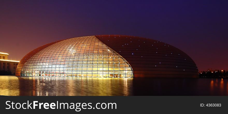 Description: The picture is the egg-shaped China National Centre for the performing Arts (China national grand theater) in night. Grand theater is the latest modern art palace of China.