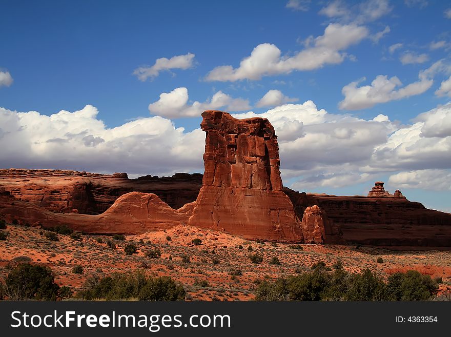 View of the red rock formations in Arches National Park with blue sky�s and clouds