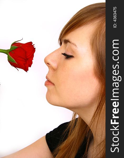 Woman with big red rose; white background. Woman with big red rose; white background
