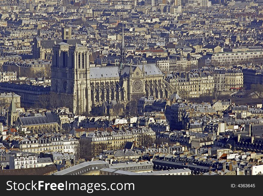 France, Paris: nice city view with Notre Dame cathedral; blue sky. France, Paris: nice city view with Notre Dame cathedral; blue sky