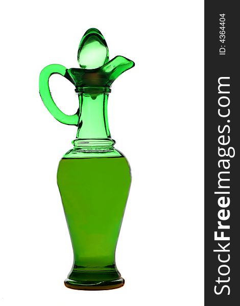 Isolated green oil or vinegar cruet or pitcher. Isolated green oil or vinegar cruet or pitcher.