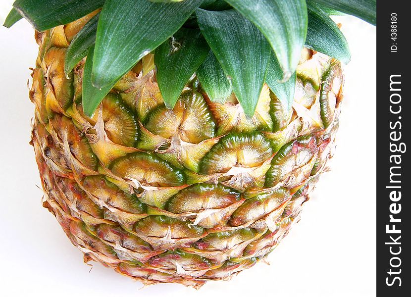 Detail of pineapple on white background