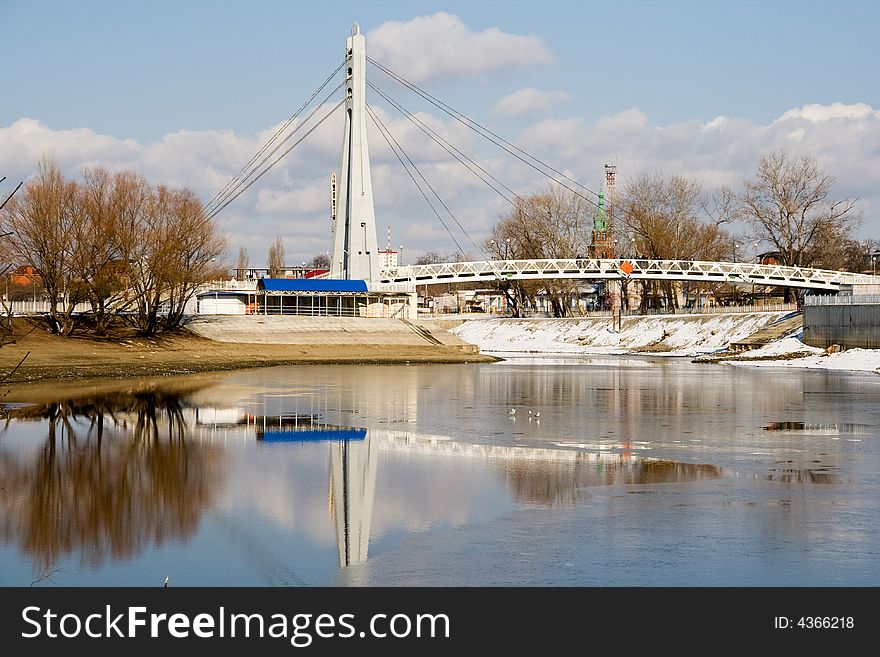 Bridge over the frozen river. Bridge over the frozen river