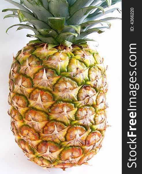 Detail of pineapple on white background