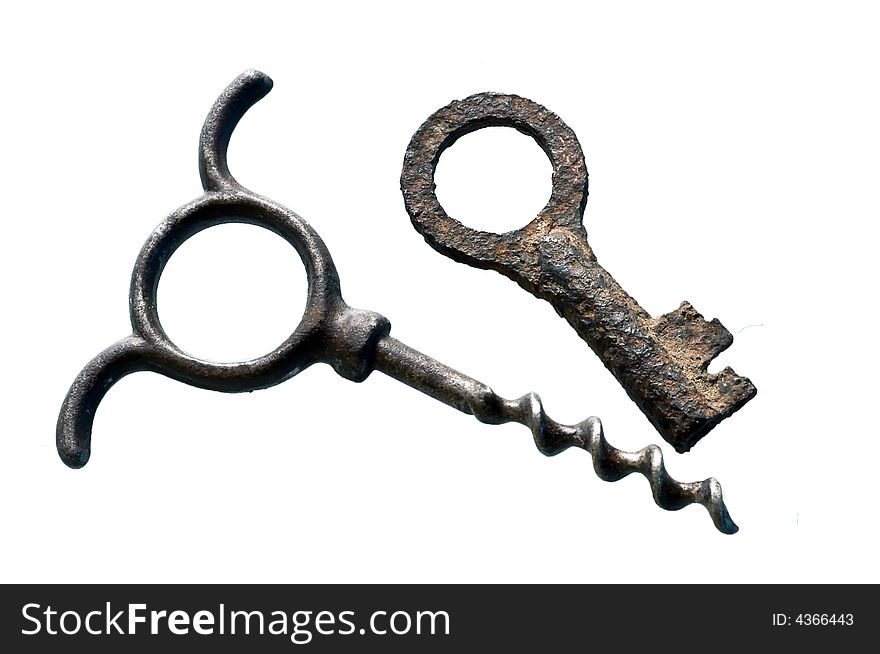 The old corkscrew and rusty key, macro