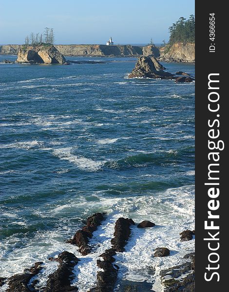 Coast of Sunset Bay State Park with Cape Arago Lighthouse. Coast of Sunset Bay State Park with Cape Arago Lighthouse