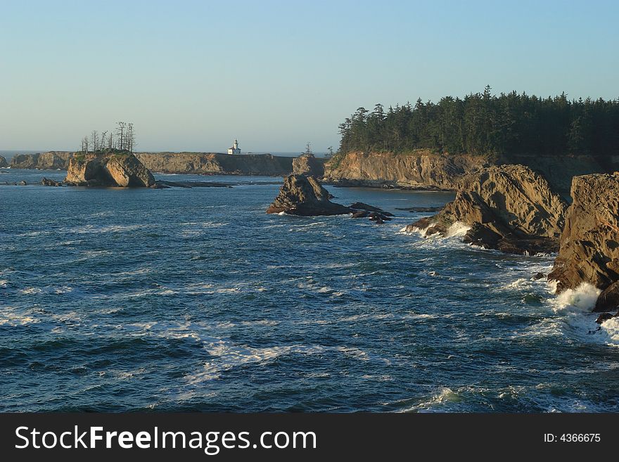 Coast of Sunset Bay State Park with Cape Arago Lighthouse. Coast of Sunset Bay State Park with Cape Arago Lighthouse