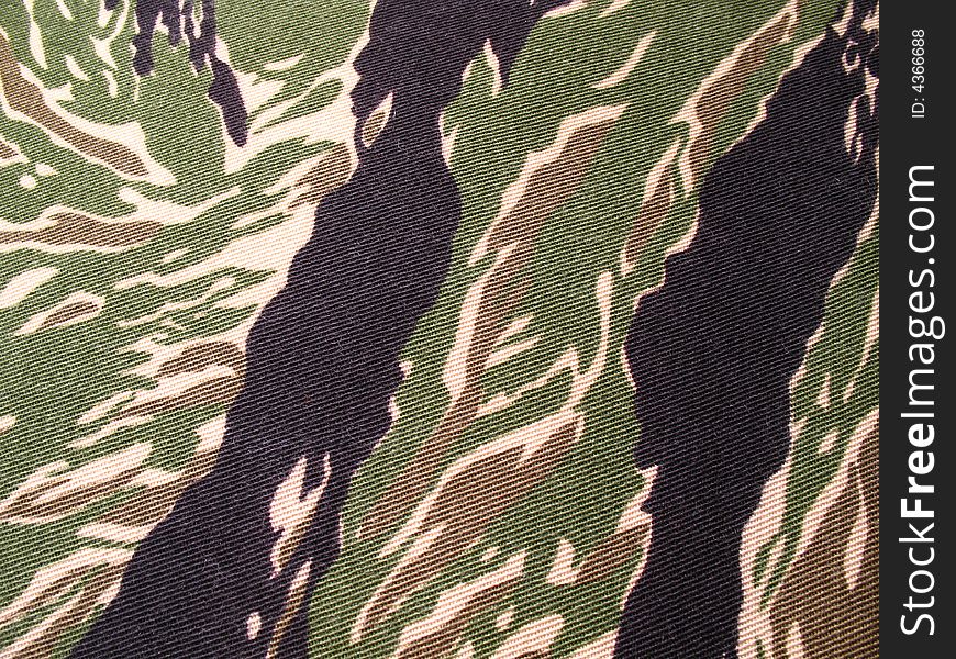 Image of cloth printed with military camouflage pattern. Image of cloth printed with military camouflage pattern