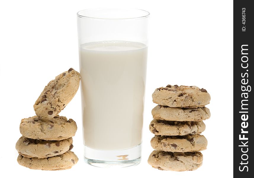 Delicious chocolate chip cookies and glass of milk isolated on a white background